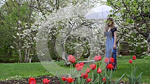 Woman umbrella garden