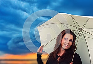 Woman with umbrella in a rainy day