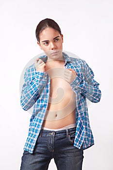 Woman in unbuttoned shirt and jeans photo