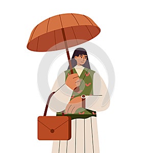 Woman under open umbrella, protecting her from fall rain. Businesswoman holding umbrela in autumn rainy weather. Person