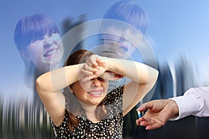 A woman under the pressure of stress in despair covered her face