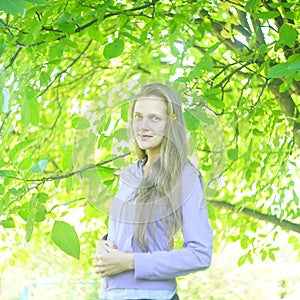 Woman under the tree