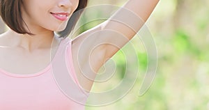Woman with underarm hair removal photo