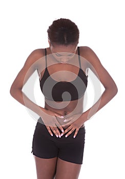 Woman in undergarments suffering from stomachache