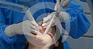 Woman undergo dental scaling treatment