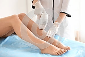 Woman undergoing hair removal procedure