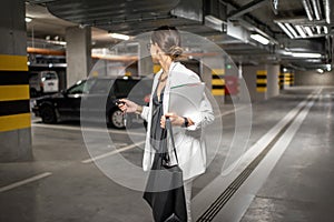 Woman in the underground car parking