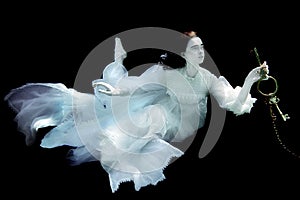 Woman Underwater Wearing White Gown