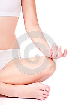 Woman in underwear meditate