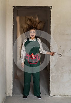 Woman in uniform holding dangerous electric wire