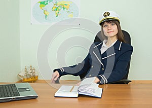 Woman in uniform of the seaman at tourist office