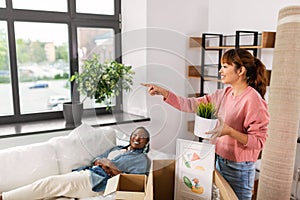 woman unpacking boxes and moving to new home