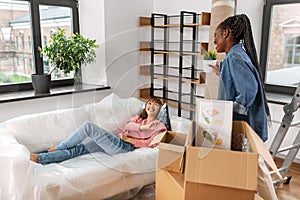 woman unpacking boxes and moving to new home