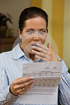 Woman with unpaid bills