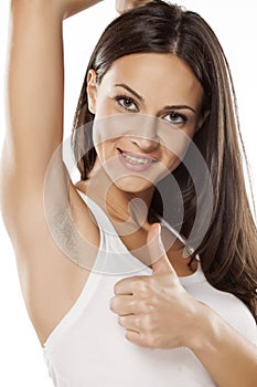 Woman with unshaved armpit