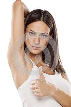 Woman with unshaved armpit