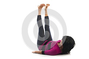 Woman in Urdhva Prasarita Padasana yoga pose photo