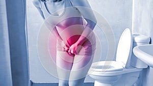 Woman with urine urgency