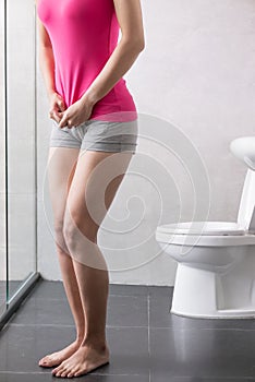 Woman with urine urgency