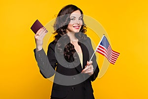 Woman with USA flag and passport