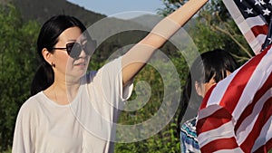 woman with usa flag, patriotic american holiday 4th of july independence day