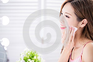 Woman use cleansing cotton
