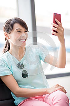 Woman use phone selfie happily