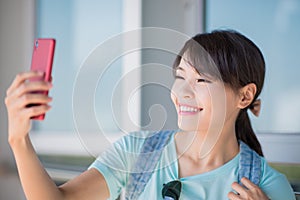 Woman use phone selfie happily