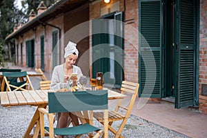 Woman use smartphone and have breakfast at morning