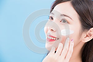 Woman use sun cream