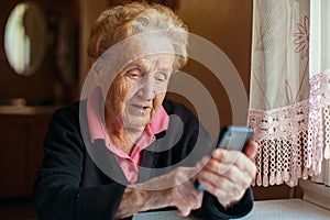 An woman uses a smart phon