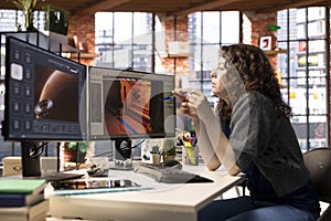 Woman using AI chatbot interface to generate video game spaceship environments