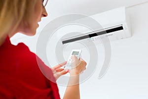 Woman using air-condition