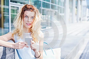 woman using app on her phone