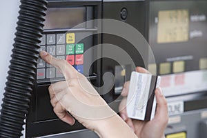 Woman Using ATM