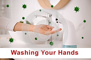 Woman using automatic soap dispenser in bathroom. Washing hands during coronavirus outbreak