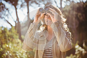 Woman using binoculars