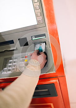 Woman using atm cash machine