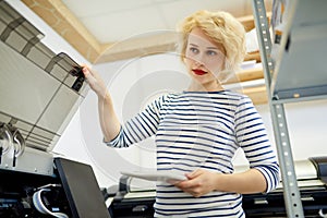 Woman Using Copy Machine
