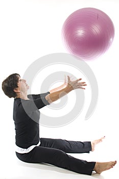 Woman using core training fitness ball exercising