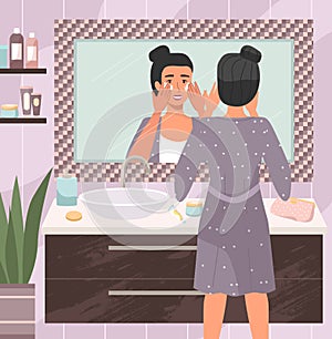 Woman using cosmetic cleansing gel to clean her face. Girl doing morning routine in the bathroom