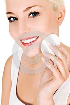 Woman using cotton pad