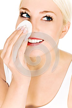Woman using cotton pad