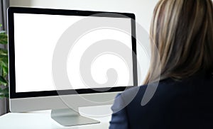 Woman using desktop computer with blank screen for mock up template background, people business technology and lifestyle