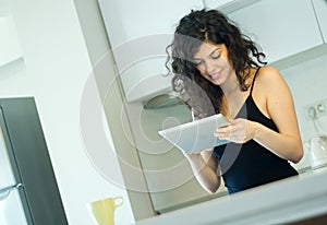 Woman using digital tablet