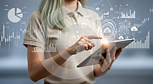 Woman using digital tablet for cloud computing and business data analysis