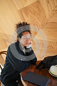 Woman using a digital tablet with an electronic pen.