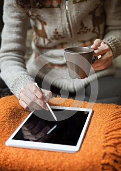 Woman Using Digital Tablet With Touch Pen