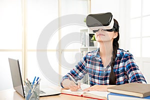 Woman using e learning with virtual reality