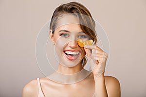 woman using eye applicator mask